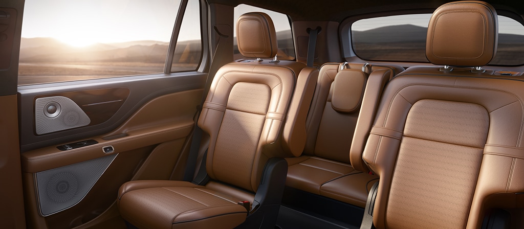 Captain’s seats in the second row of a 2025 Lincoln Black Label Aviator® SUV are shown in the Flight interior theme