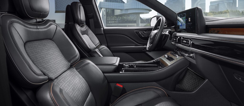 The interior of a 2027 Lincoln Aviator® Black Label™ SUV with the Invitation theme