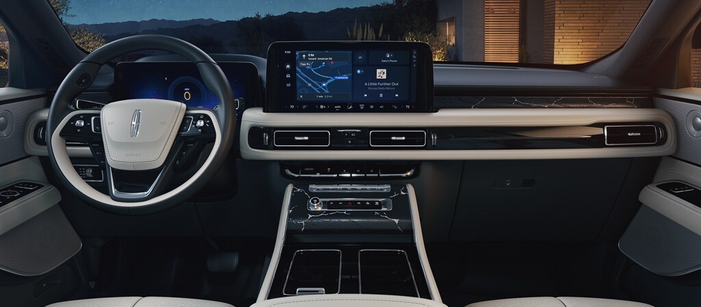 The full dash of a 2027 Lincoln Aviator Black Label™ SUV with the Moonbeam interior theme