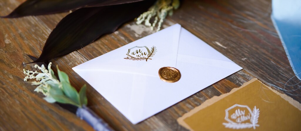 A wax-sealed envelope acts as an invitation to you