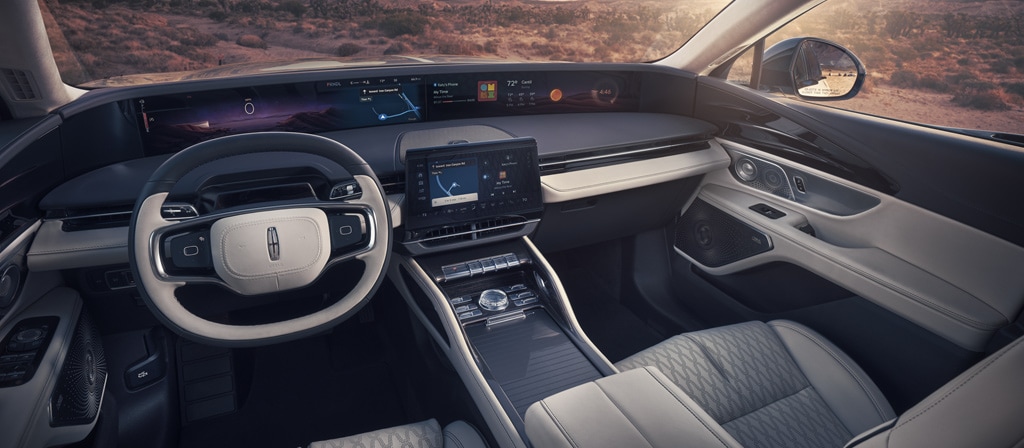 The front dash of a 2026 Lincoln Black Label™ Nautilus® SUV in the Chalet theme featuring the 48-inch panoramic display