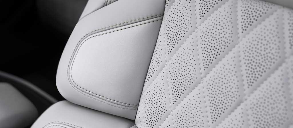 The quilted front seat of the Atmospheric theme in a 2027 Lincoln Navigator® Black Label™ SUV features extra padding