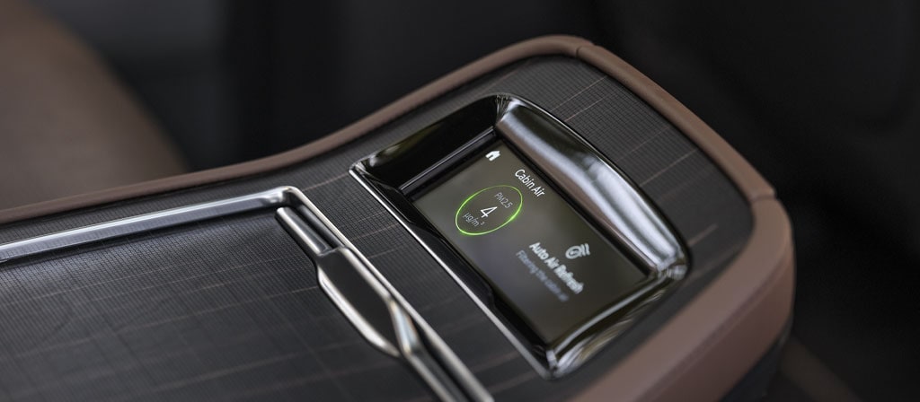 The Horizon Grid real-wood appliqué carries through to the second row controls in the 2027 Lincoln Navigator® Black Label™ SUV