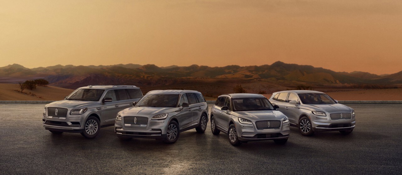 Lincoln vehicles in the Ingot Silver exterior color are shown in the mountains