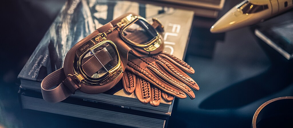 Aviation goggles and gloves hint suggest inspiration of the Lincoln Black Label Flight theme
