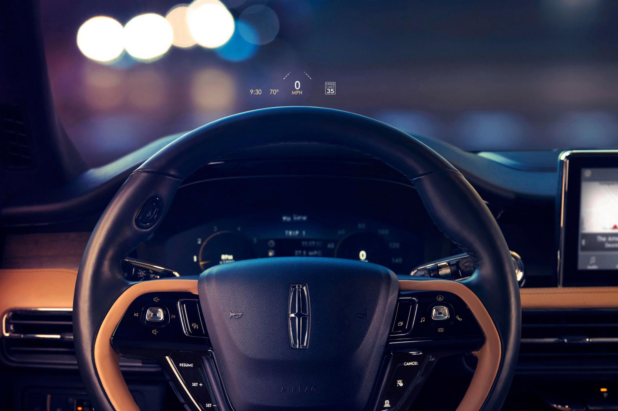 The Lincoln Corsair steering wheel and head-up display.