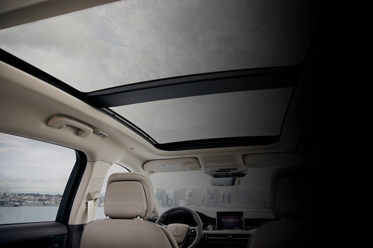 The available panoramic Vista Roof® is seen from inside a 2025 Lincoln Corsair® SUV