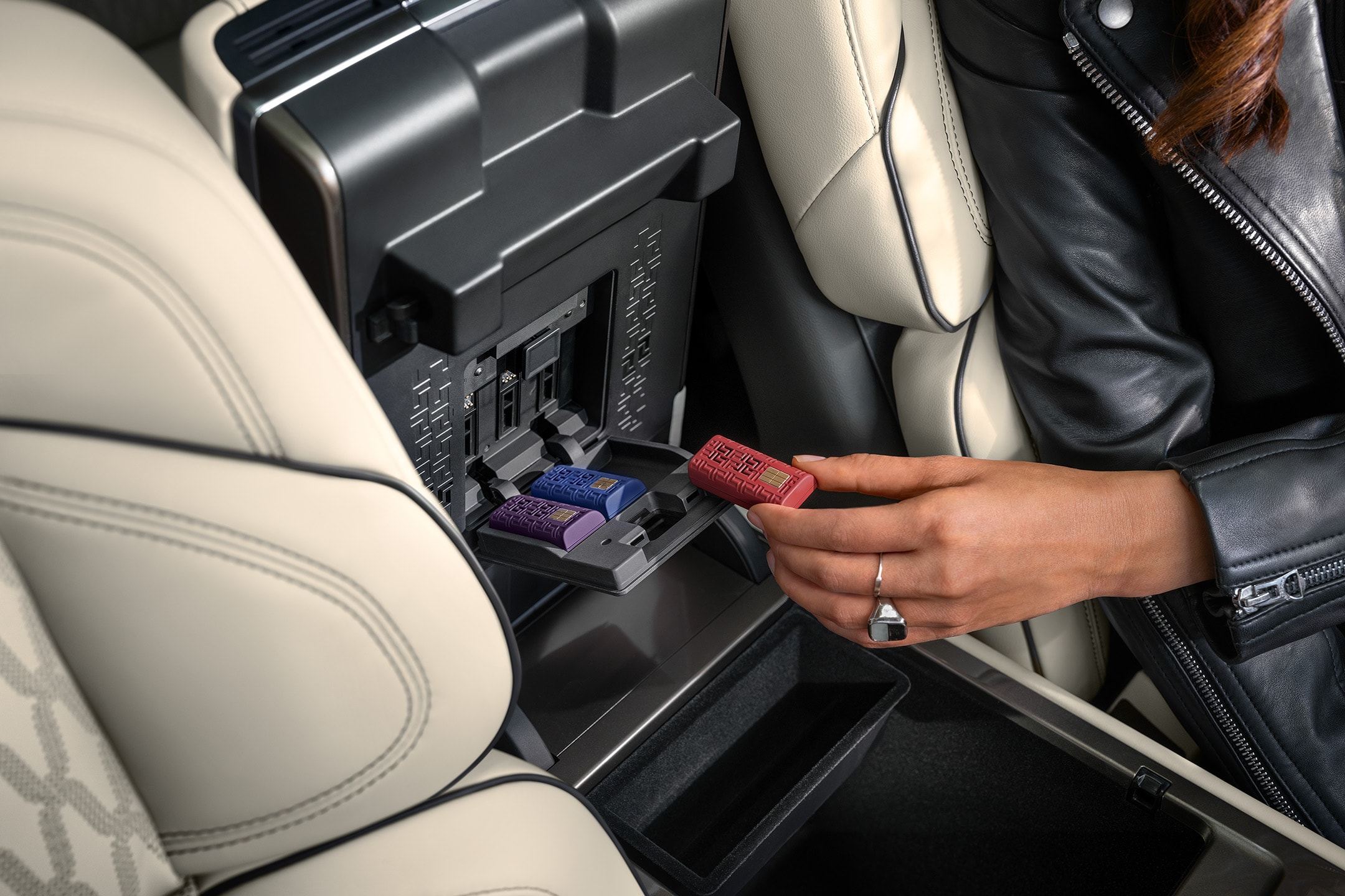 Digital Scent cartridges are shown inserted within the front armrest.