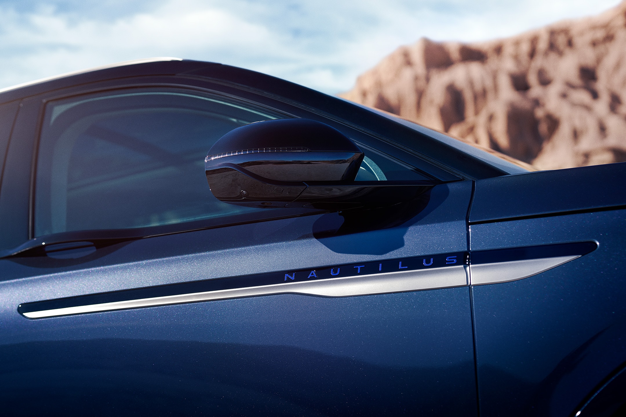 The sideview mirrors of a 2024 Lincoln Nautilus® SUV are in the extended position.