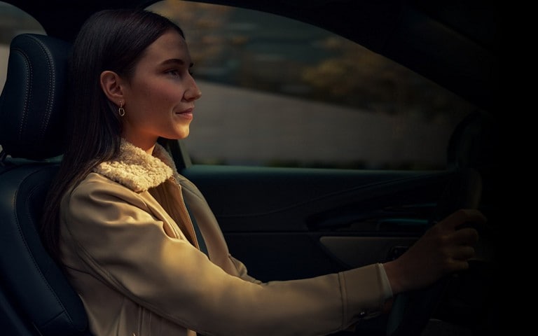A woman drives a 2026 Lincoln Nautilus® SUV