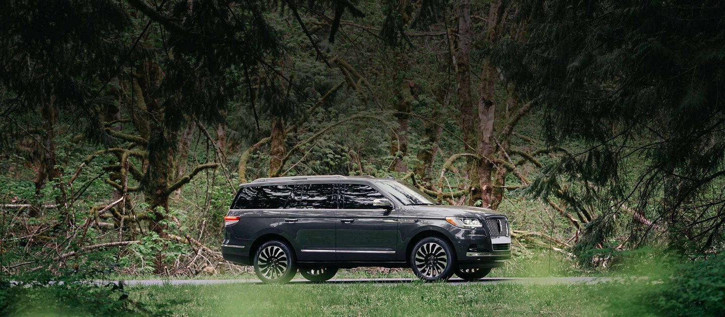 A 2023 Lincoln Black Label Navigator® SUV shows off the exterior design of the Lincoln  Black Label Central Park theme.