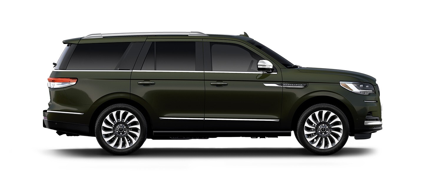 El perfil de una SUV Lincoln Black Label Navigator® 2023 en verde Manhattan​​​​​​​.