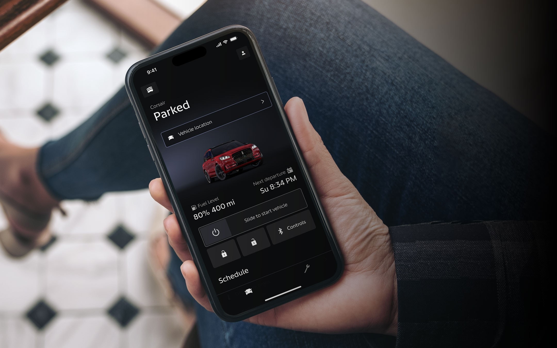 A woman using her smartphone and accessing the Lincoln Way app