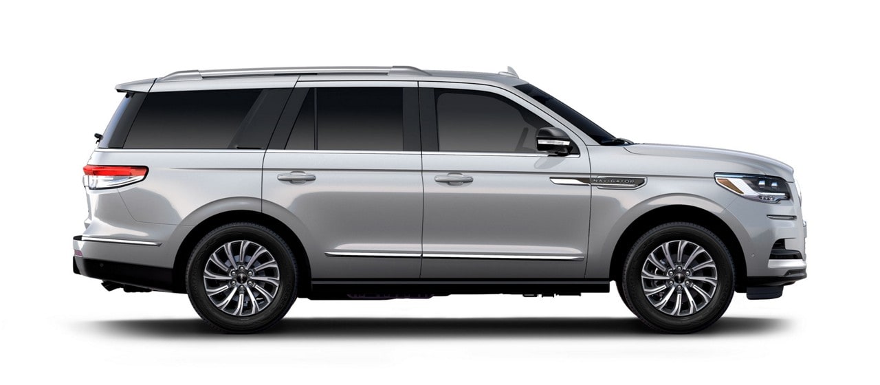 The passenger side of The 2024 Lincoln Navigator is shown in Silver Radiance.