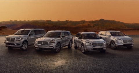 2021 Lincoln lineup of vehicles parked in front of forest hills