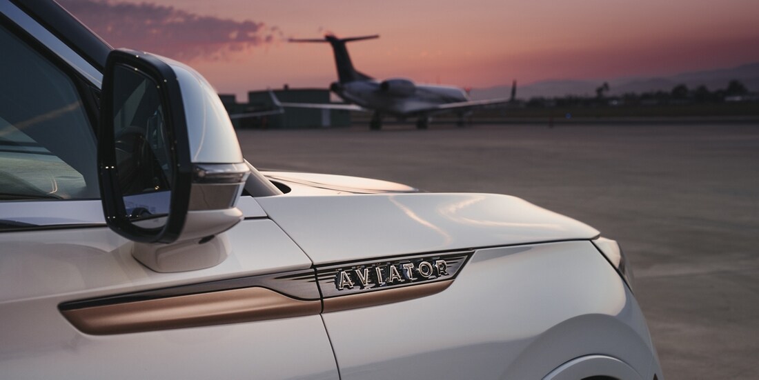 The exterior of the Lincoln Aviator SUV Shinola concept on an airport runway is shown here.