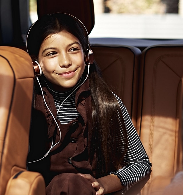 Children in the second and third roll seats of a 2021 Lincoln
