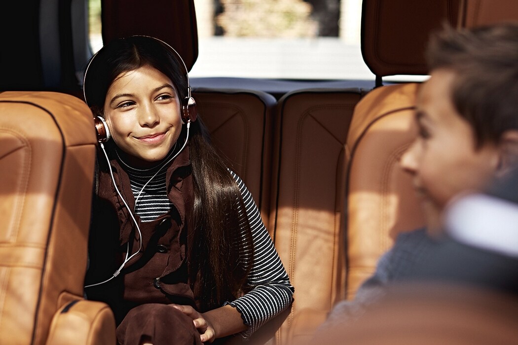 Children in the second and third roll seats of a 2021 Lincoln