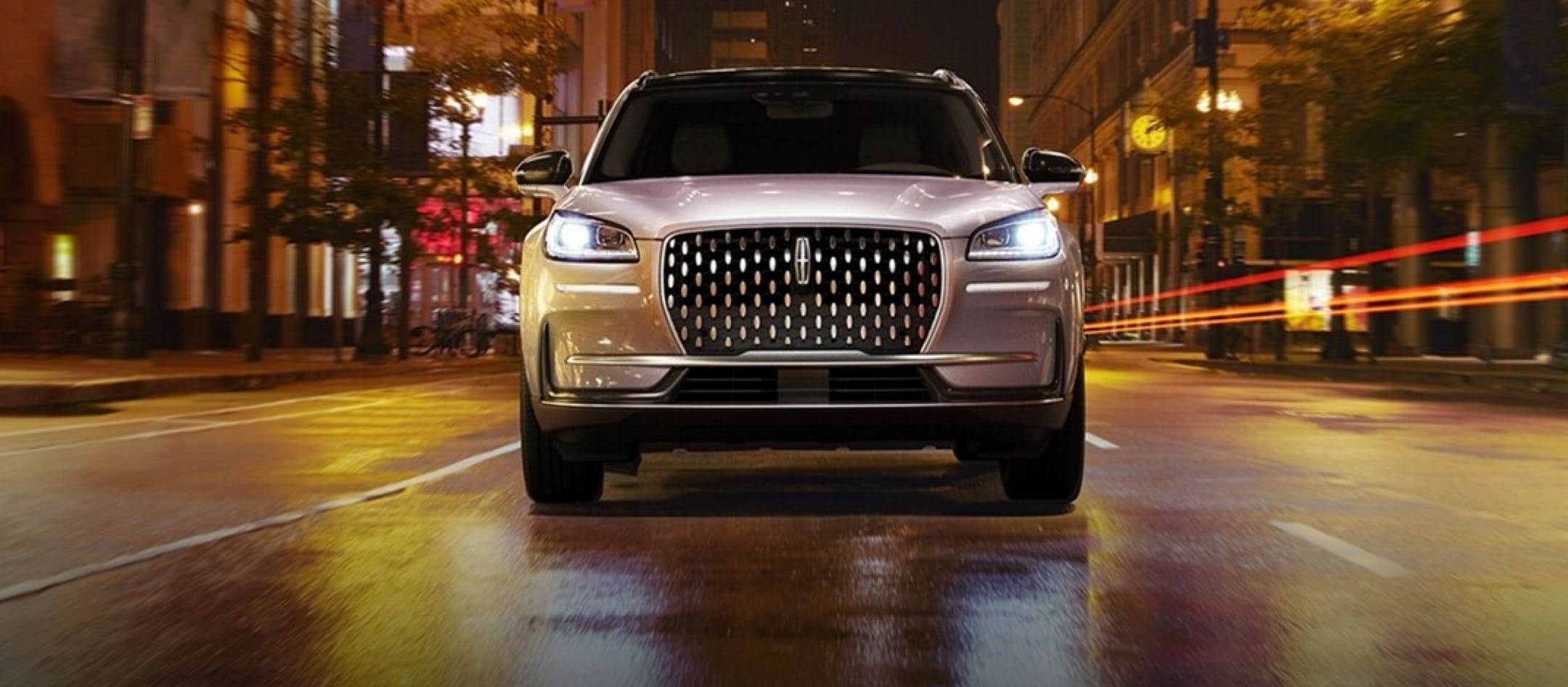 The Lincoln Corsair driving down the road.