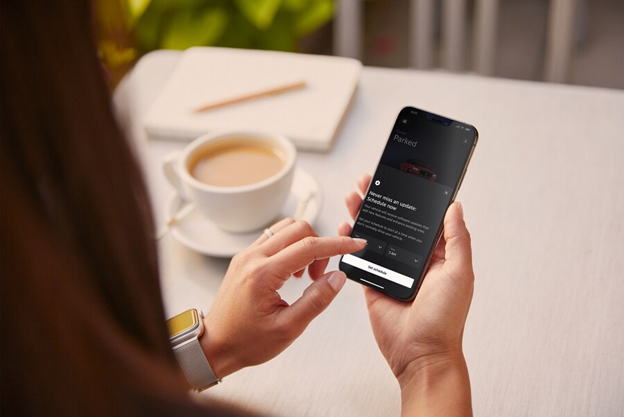 A person holds their smartphone displaying the Lincoln Way® app