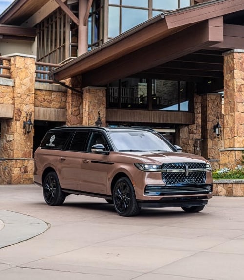 A 2026 Lincoln Navigator® parked in front of Utah’s Stein Eriksen Lodge