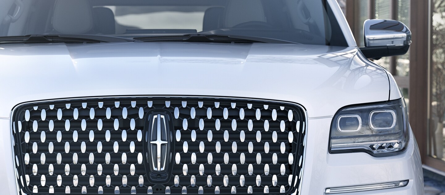 The grille of a Lincoln Navigator is shown.
