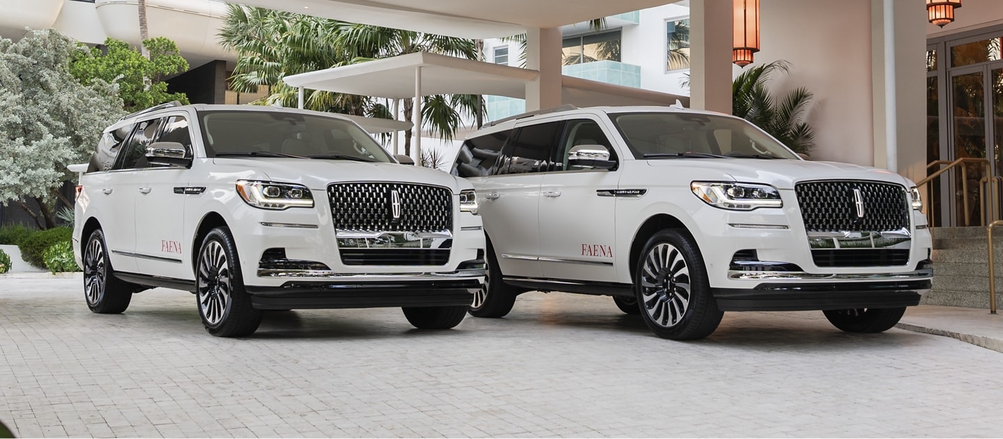 Two Lincoln vehicles parked side by side.