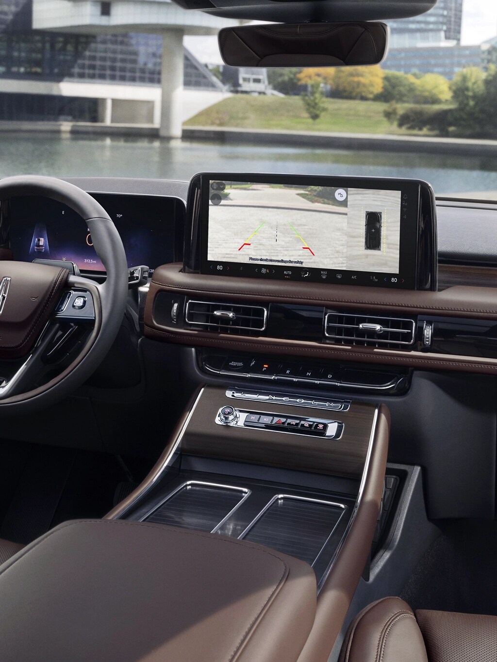 The center touchscreen inside a 2025 Lincoln Aviator® SUV displays the rear camera view.