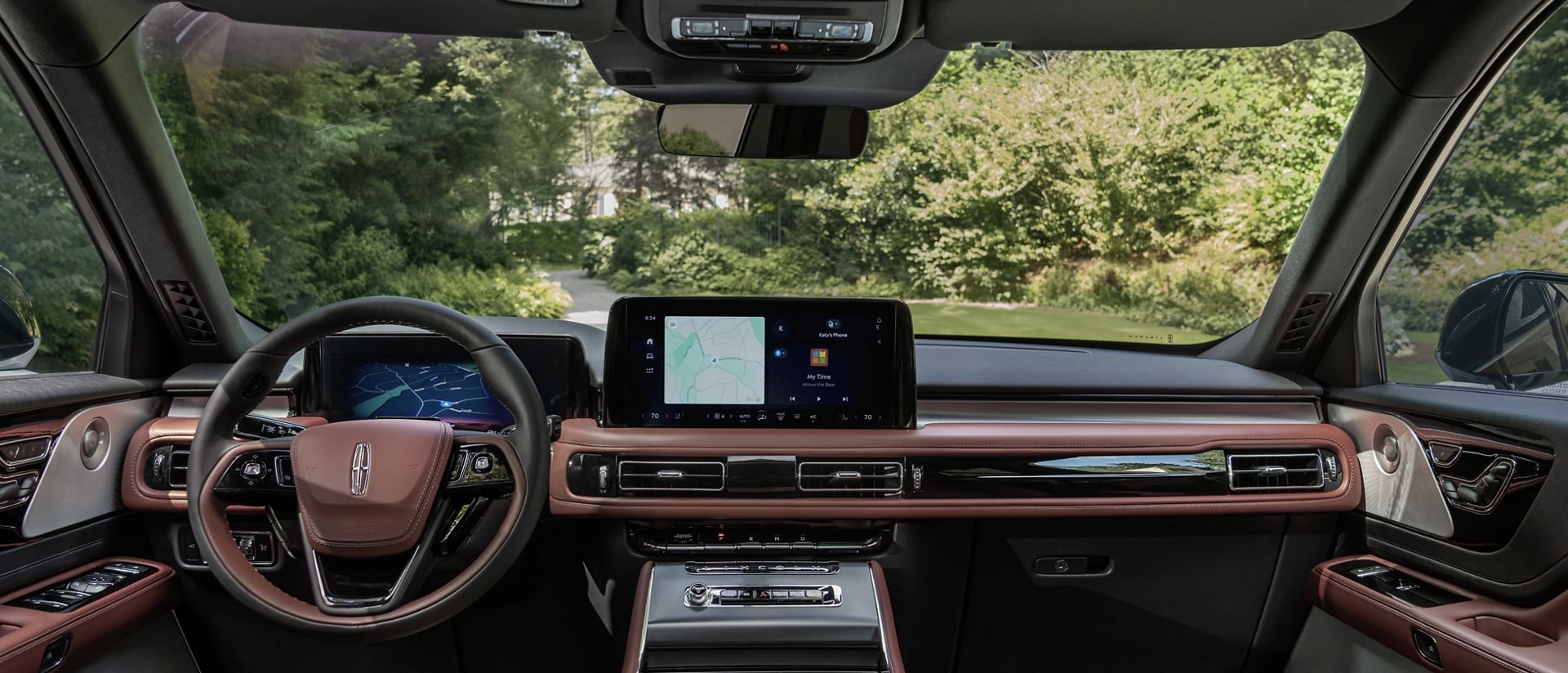 A couple sits in the front seats of a 2025 Lincoln Aviator® SUV