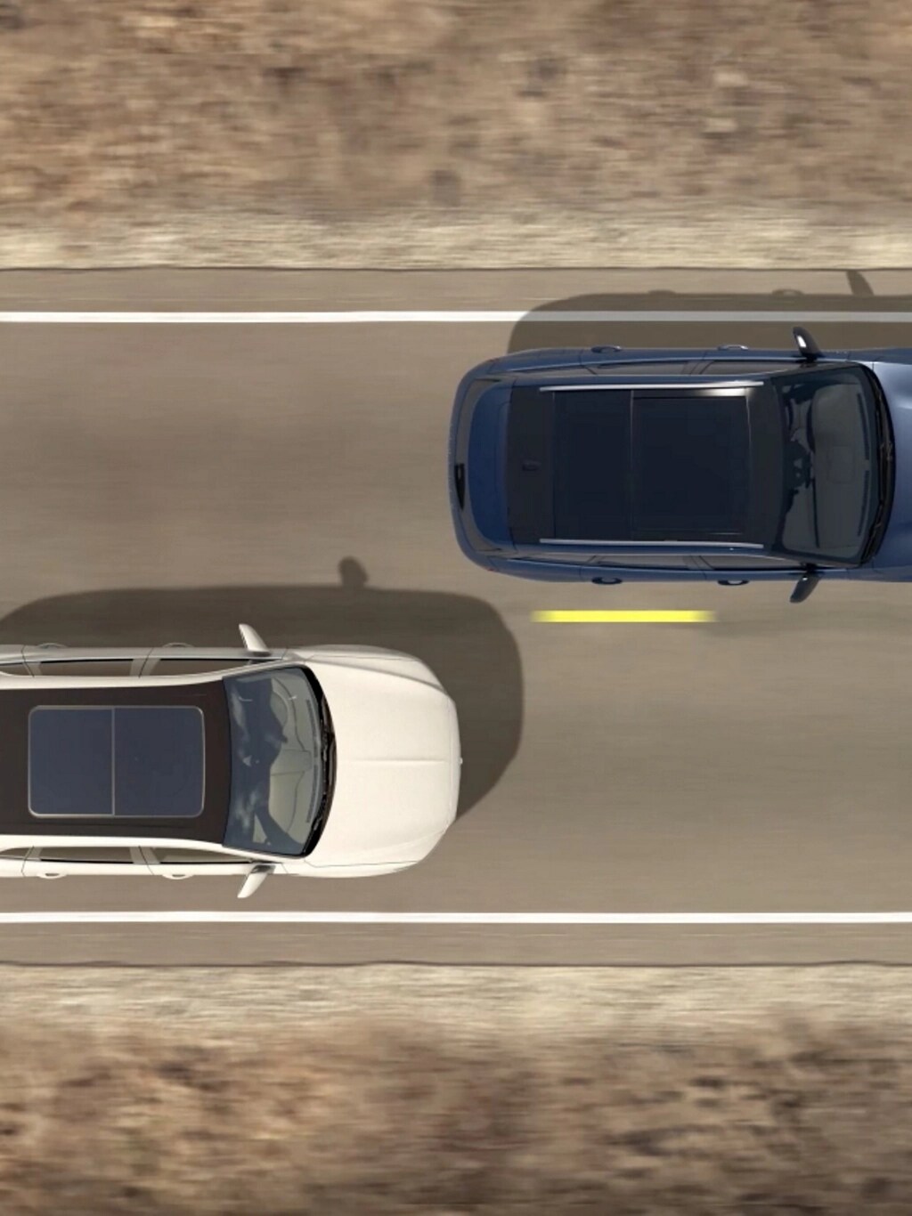 An overhead illustration of two cars being driven indicates how blind spot detection.