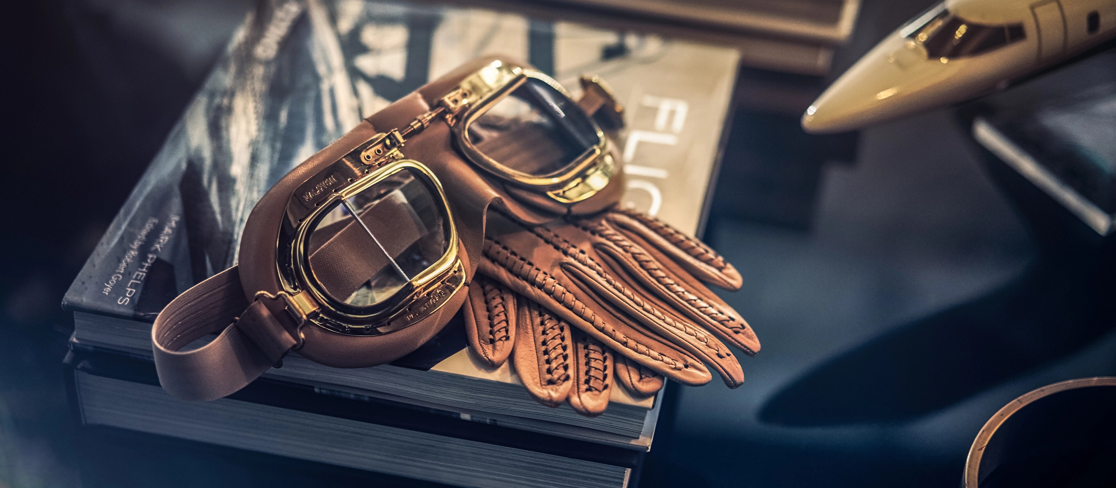 Aviation goggles and gloves hint suggest inspiration of the Lincoln Black Label Flight theme