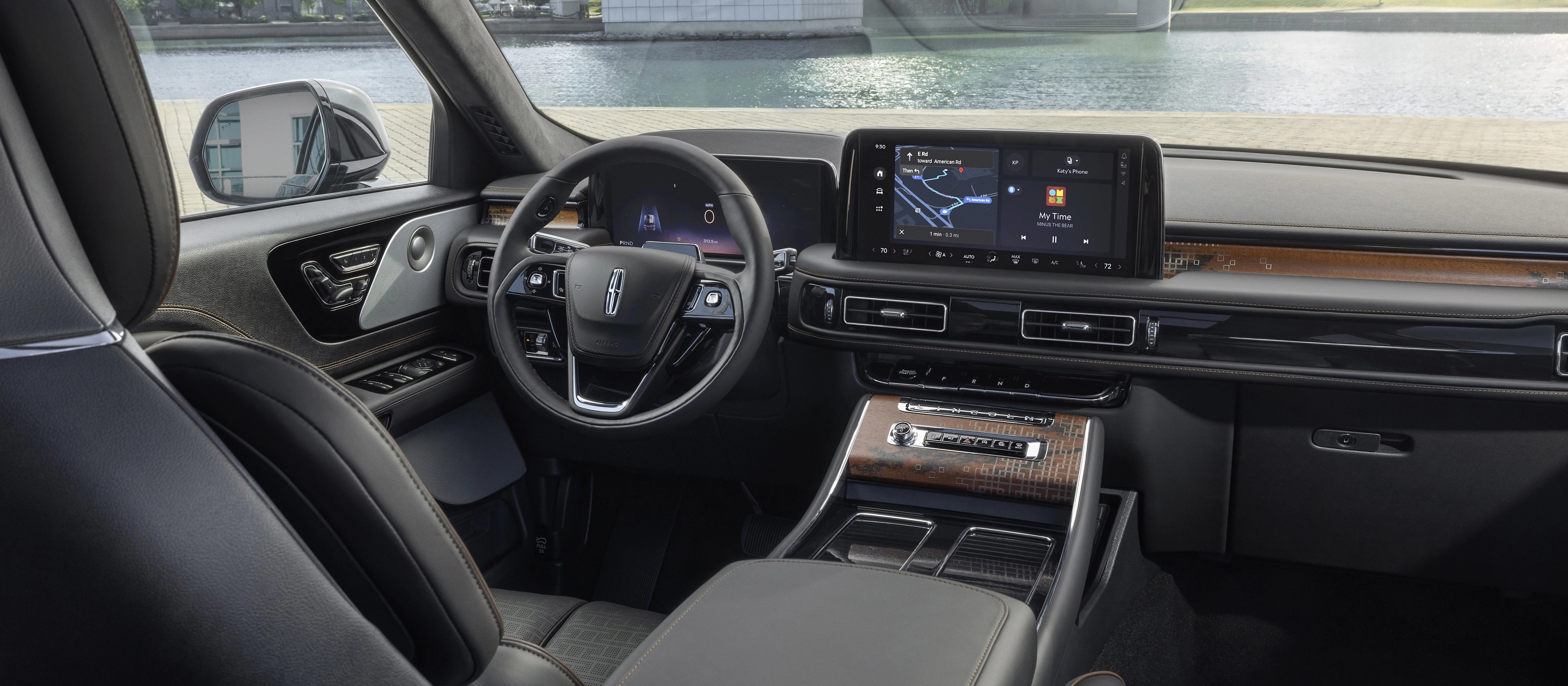 The front cabin of a 2025 Lincoln Black Label Nautilus® SUV is shown in the Invitation interior theme