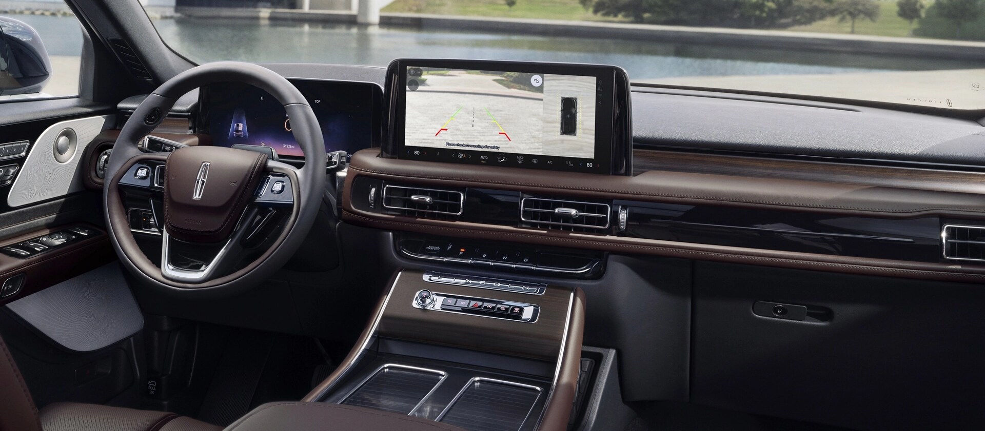 A rear view of what is behind a 2026 Lincoln Aviator® SUV is shown in the center touchscreen