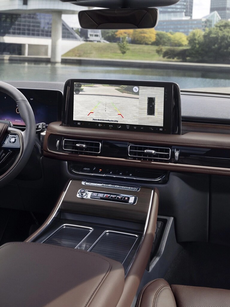 A rear view of what is behind a 2026 Lincoln Aviator® SUV is shown in the center touchscreen