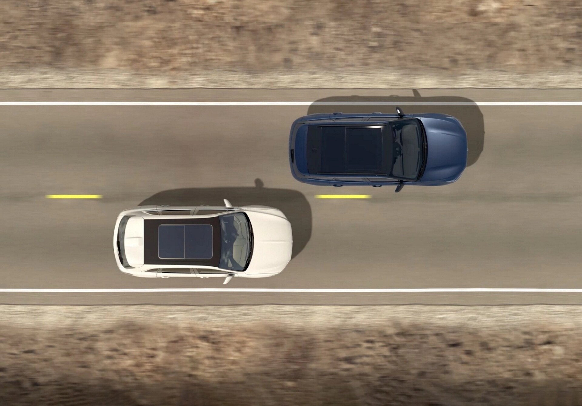 An overhead illustration of two cars being driven indicates how blind spot detection operates