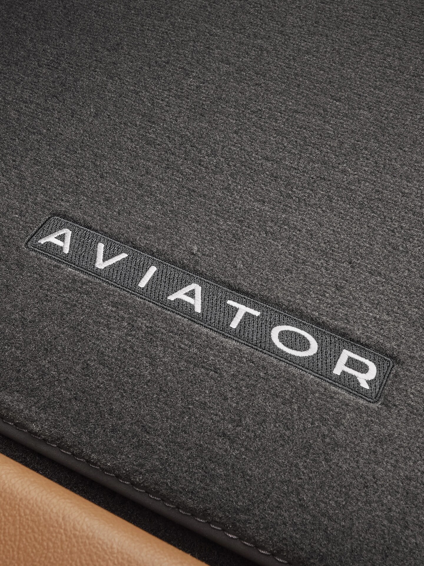 Interior of the 2026 Lincoln Aviator with carpet floor mats