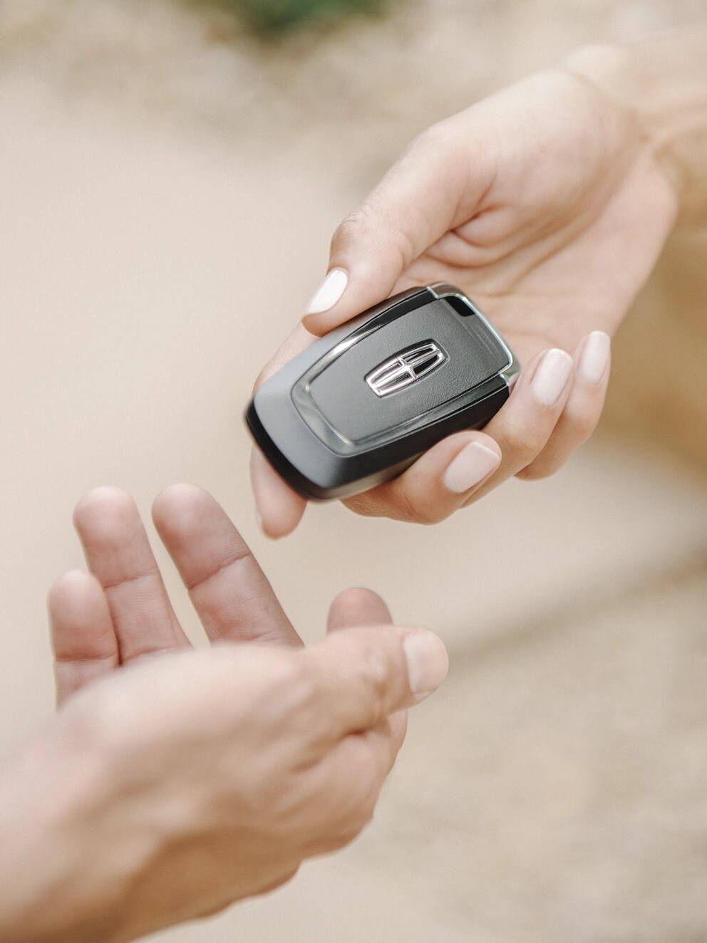 The Key fob for a Lincoln vehicle.