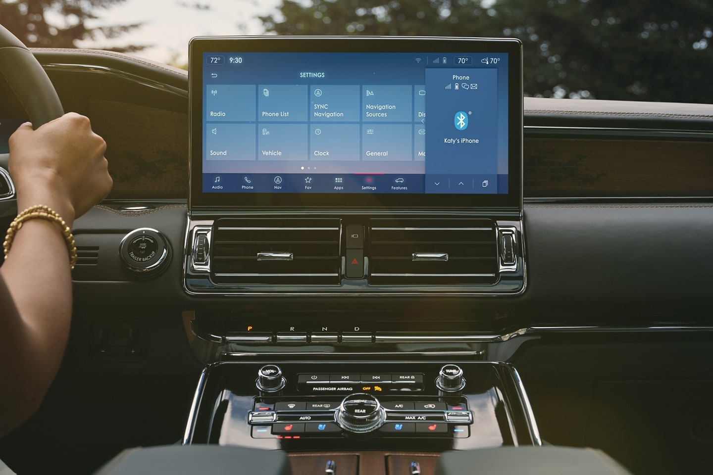 The 13.2-inch LCD center touchscreen shows the SYNC® 4 interface that pulls your mobile device view on screen.
