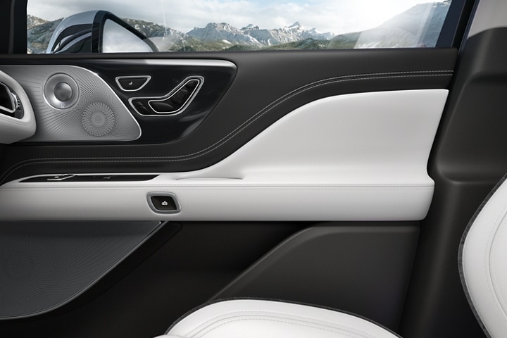 The interior of the front passenger door of a 2023 Lincoln Aviator® Black Label model is shown