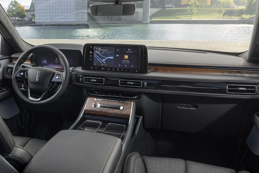The front cabin of a 2025 Lincoln Black Label Aviator® SUV is shown in the Invitation interior theme