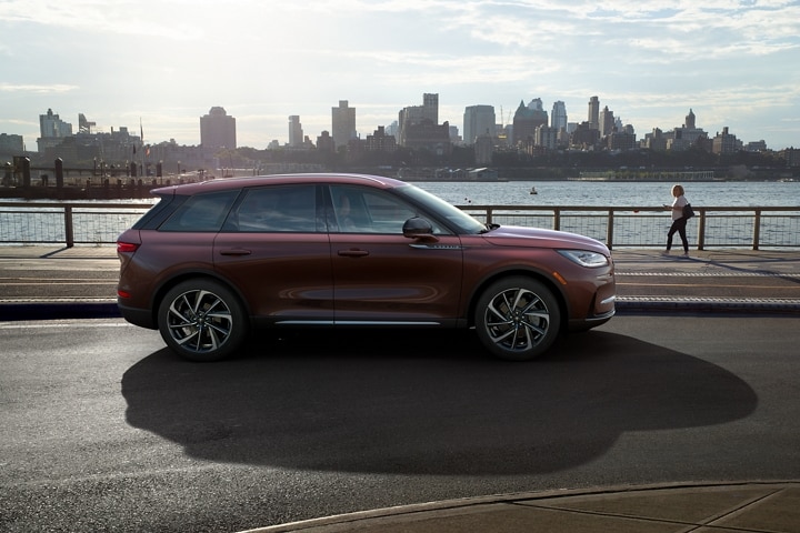 A 2023 Lincoln Corsair® SUV is parked in a riverside park