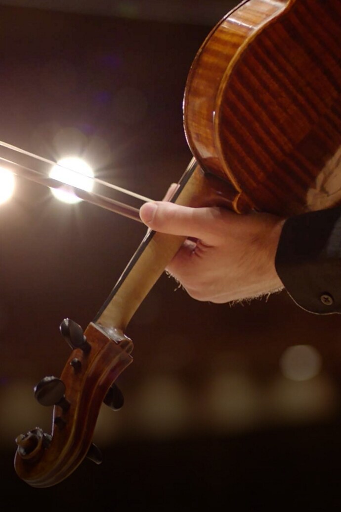 A man playing the violin.