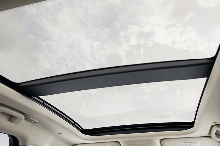 The available panoramic Vista Roof® is seen from inside a 2025 Lincoln Corsair® SUV