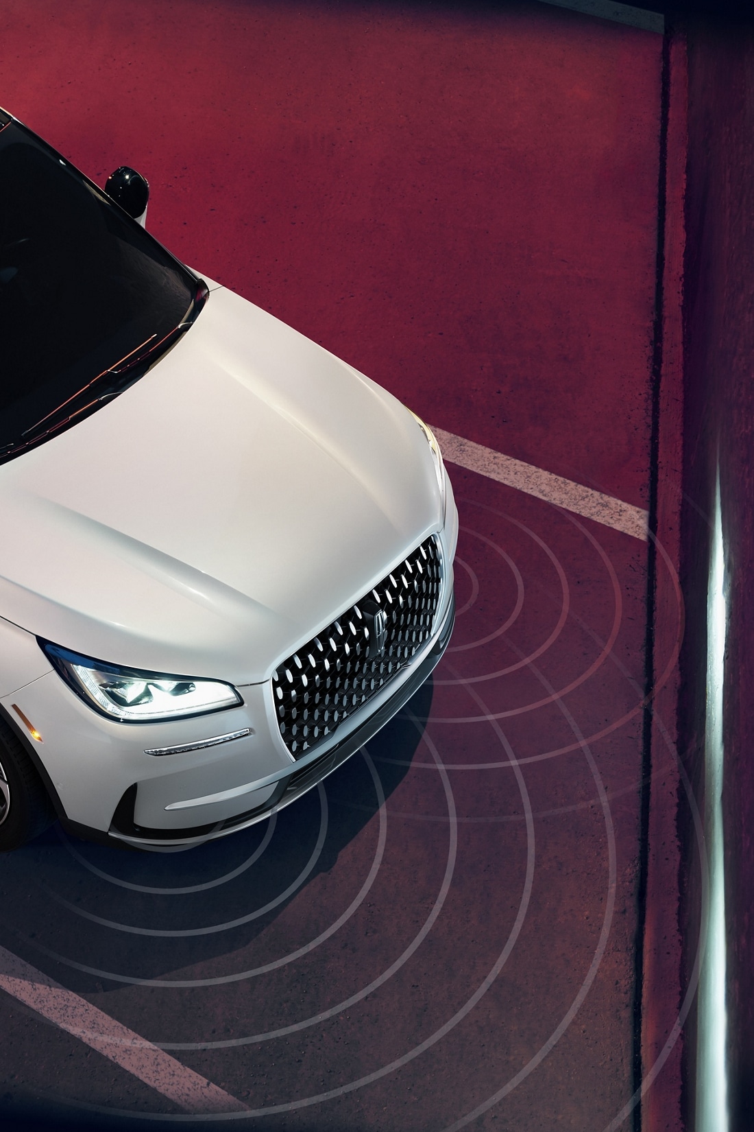 Simulated sensing waves emit from a 2025 Lincoln Corsair® SUV to demonstrate Pre-Collision Assist