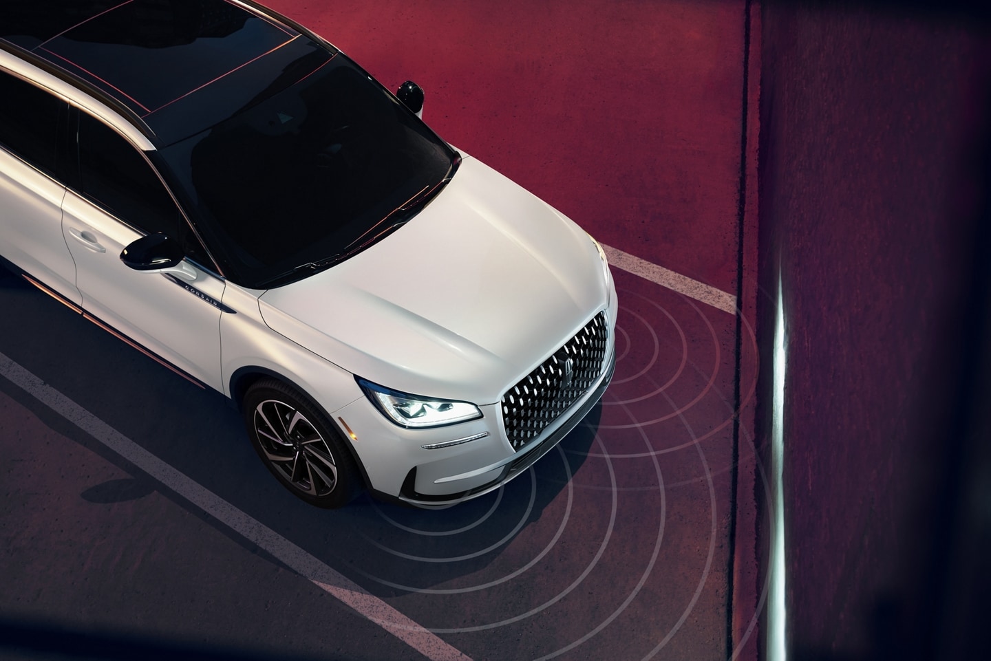 Simulated sensing waves emit from a 2025 Lincoln Corsair® SUV to demonstrate Pre-Collision Assist