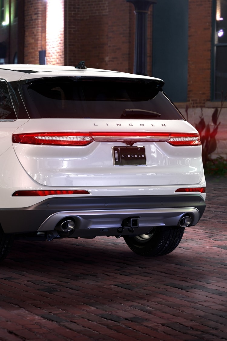 The rear of a 2025 Lincoln Corsair® Premiere model is shown with a trailer hitch receptacle included