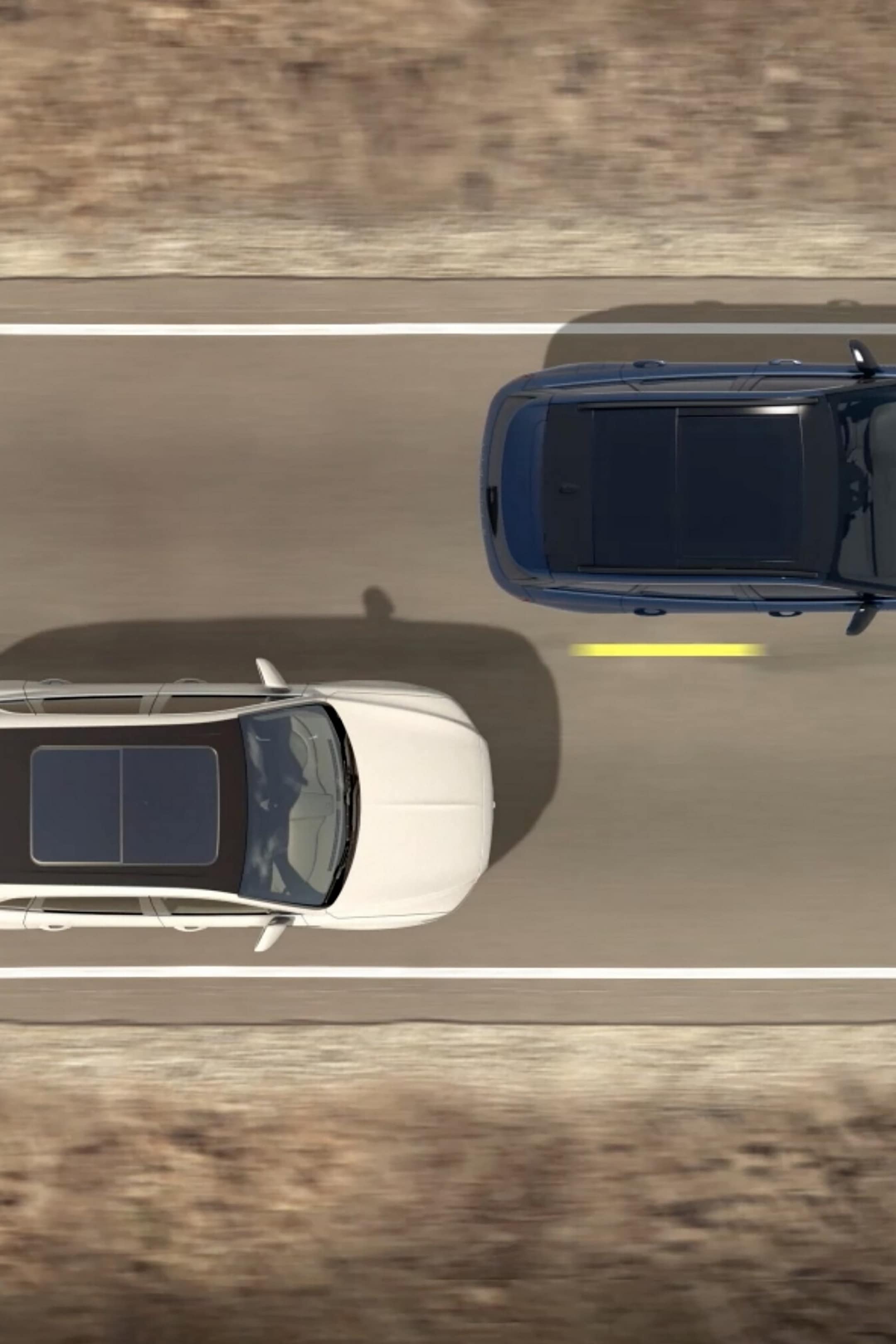 Two vehicles are shown from overhead to demonstrate the Blind-Spot Information System