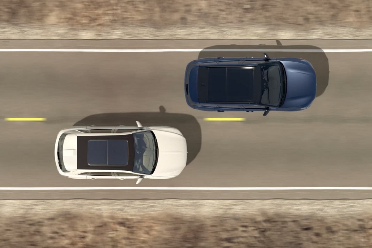Two vehicles are shown from overhead to demonstrate the BlindSpot Information System