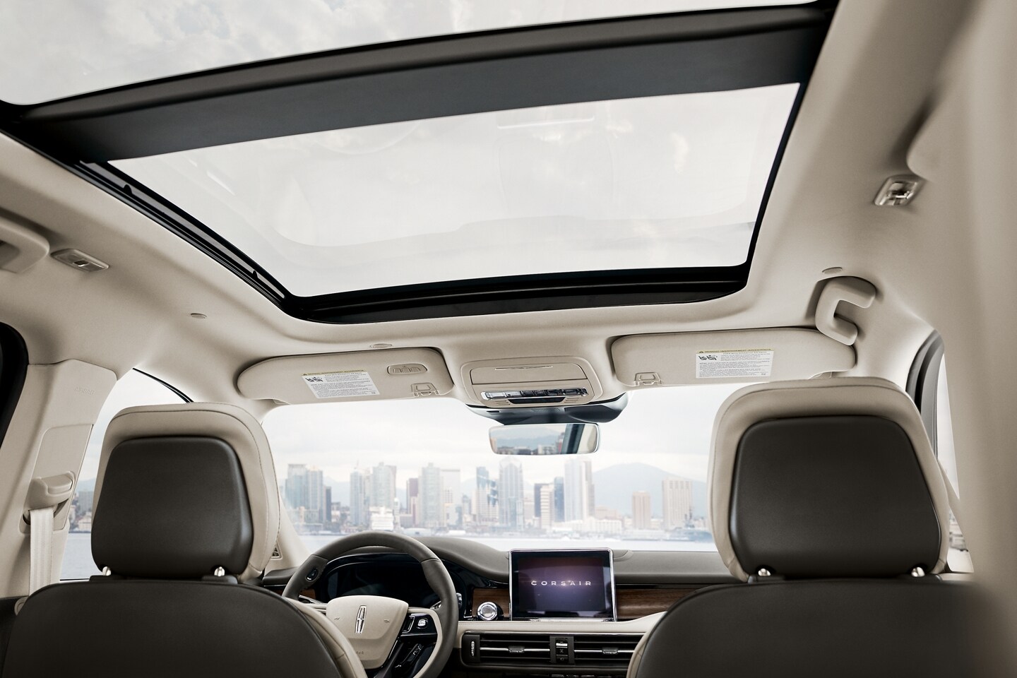 The available panoramic Vista Roof® is shown from inside a 2026 Lincoln Corsair® SUV