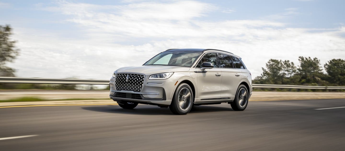 2026 Lincoln Corsair® reserve model with the available Jet Apperance Package is being driven on a highway